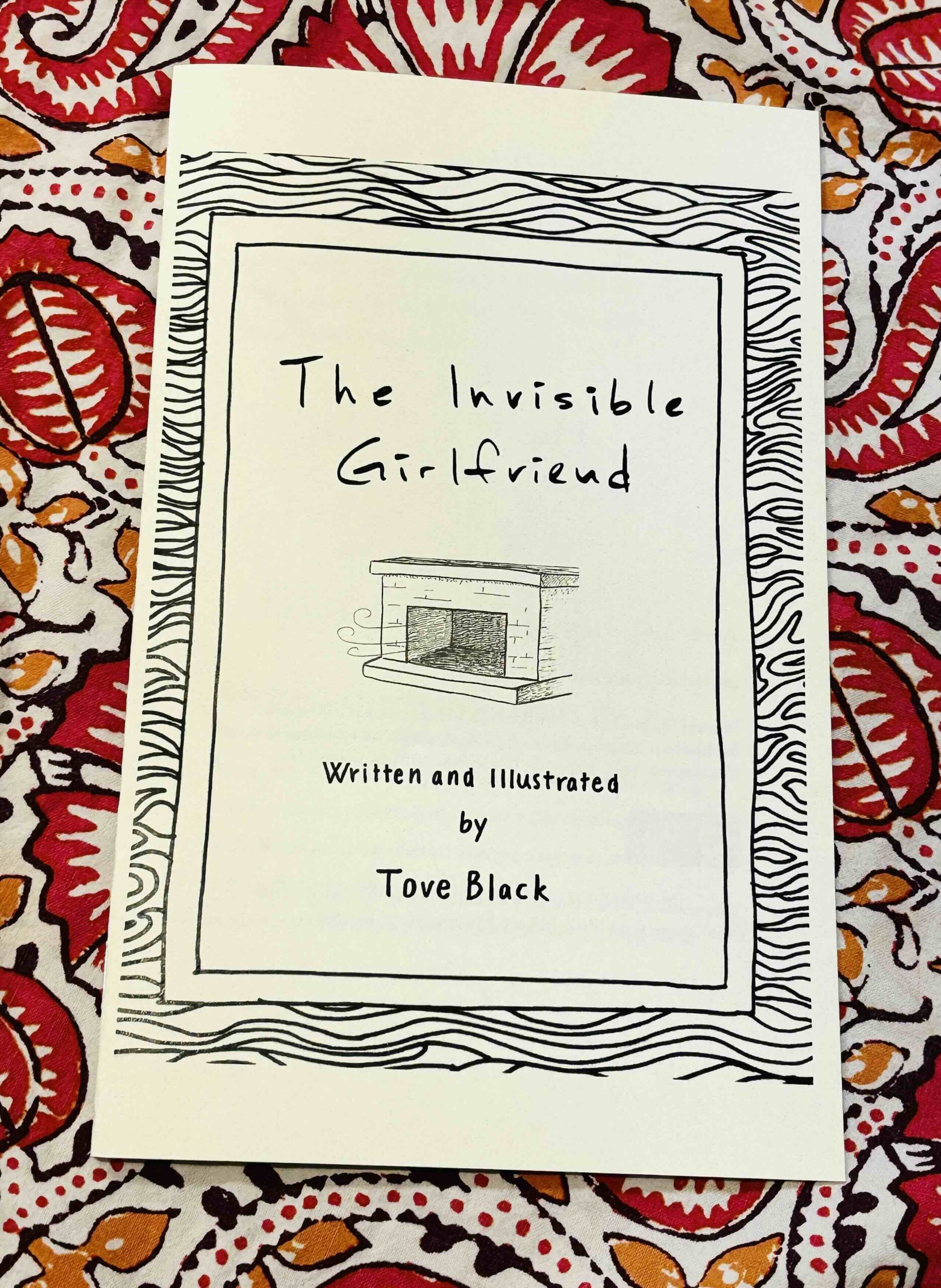 A zine: The invisible girlfriend, with a drawing of a fireplace, a gust of wind coming out of it.